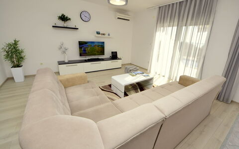 Aurora: Living Room, Furniture, Property, Room, Interior Design, Floor, Table, Wall, Coffee Table, Building
