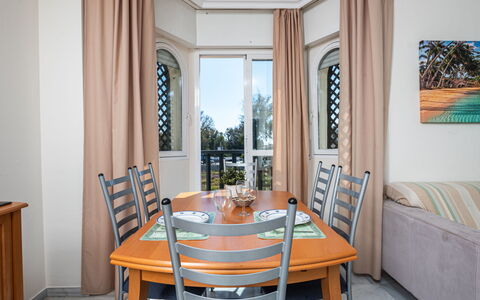 Lorcrimar Ii: Table, Furniture, Property, Window, Wood, Chair, Interior Design, Curtain, Flooring, Floor