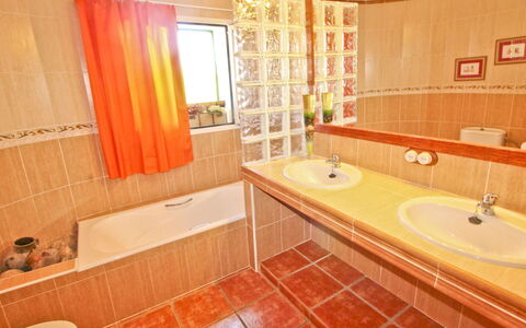 Villa Lavanda: Bathroom, Property, Room, Bathtub, Interior Design, Orange, Tile, Building, Floor, Real Estate