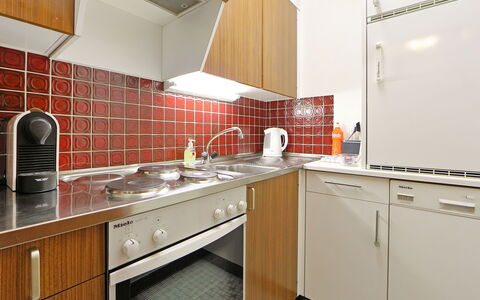 Apollo: Room, Property, Countertop, Kitchen, Cabinetry, Furniture, Interior Design, Tile, Building, Kitchen Stove