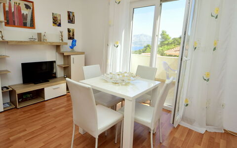 Villa Bay View: Room, Property, Furniture, Floor, Interior Design, Table, Dining Room, Wood Flooring, Building, House