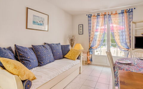 Vaux sur Mer 450: Property, Room, Furniture, Bedroom, Real Estate, Yellow, Bed, Interior Design, Building, House