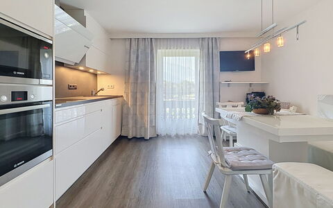 Aschau im Zillertal 495: Furniture, Interior Design, Kitchen, Flooring, Countertop, Wood, Ceiling, Floor, Kitchen Appliance, Cabinetry