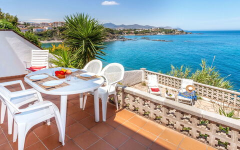 Nicolas: Water, Sky, Table, Plant, Furniture, Property, Building, Seaside Resort, Azure, Chair
