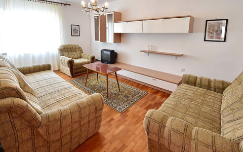 Nera: Furniture, Room, Living Room, Property, Interior Design, Floor, Wood Flooring, Table, Couch, Building