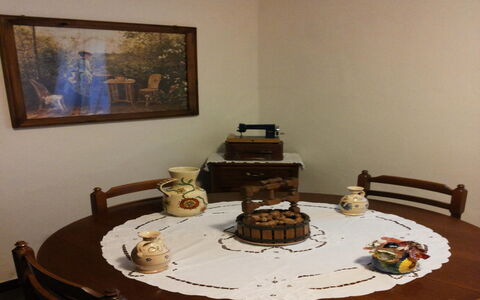 Appartamento Porretta Terme: Room, Table, Furniture, Interior Design, Tourist Attraction, Dessert, House