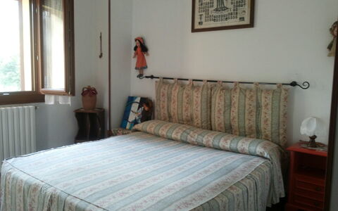 Appartamento Porretta Terme: Bedroom, Bed, Furniture, Room, Bed Sheet, Property, Bedding, Mattress, Bed Frame, Floor