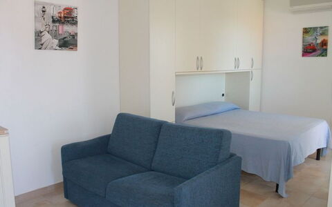 Scarlino Summer Village: Furniture, Room, Property, Floor, Couch, Interior Design, Building, Sofa Bed, Living Room, Comfort