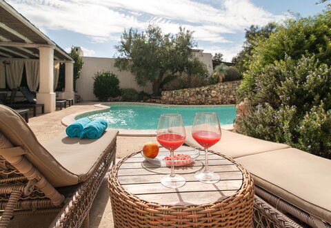 Salento Luxury Retreat: Water, Cloud, Sky, Property, Tableware, Plant, Azure, Swimming Pool, Outdoor Furniture, Chair