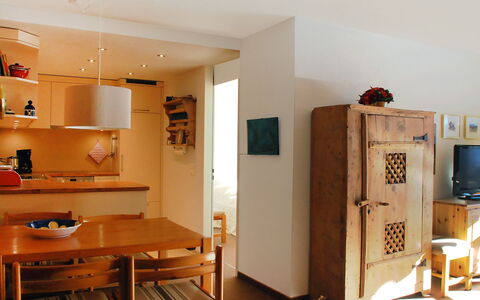 Disentis 100: Room, Furniture, Property, Interior Design, Building, Refrigerator, House, Floor, Architecture, Ceiling