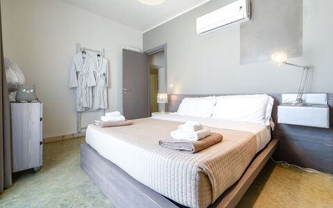 Trulli Itaka: Bedroom, Bed, Furniture, Room, Property, Mattress, Bed Sheet, Bed Frame, Interior Design, Floor