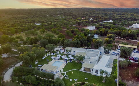 Trulli Itaka: Plant, Sky, Cloud, Tree, Urban Design, Land Lot, Grass, Landscape, Public Space, City