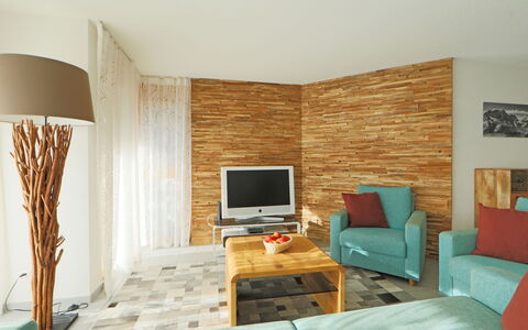 Susanna: Furniture, Property, Table, Comfort, Television, Building, Wood, Picture Frame, Cabinetry, Interior Design