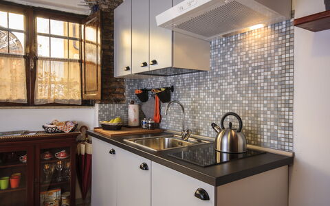 Diamonds & Rust: Countertop, Room, Property, Cabinetry, Kitchen, Tile, Furniture, Interior Design, Building, Ceiling
