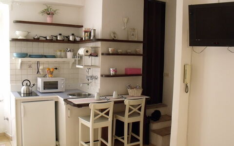 Studio Moremi': Property, Shelf, Table, Shelving, Wood, Desk, Countertop, Cabinetry, Interior Design