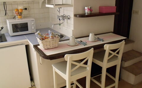 Studio Moremi': Table, Furniture, Countertop, Product, Cabinetry, Wood, Interior Design, Kitchen Stove, Kitchen, Floor