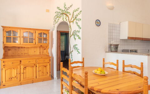 Valledoria 715: Cabinetry, Furniture, Property, Building, Table, Wood, Interior Design, Chair, Kitchen, Wood Stain