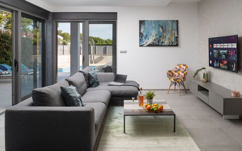 Villa Fasana: Furniture, Interior Design, Couch, Living Room, Flooring, Floor, Table, Coffee Table, Throw Pillow