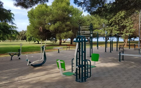 Villa Fasana: Playground, Public Space, Outdoor Play Equipment, Human Settlement, Swing, Tree, Park, City, Leisure, Recreation