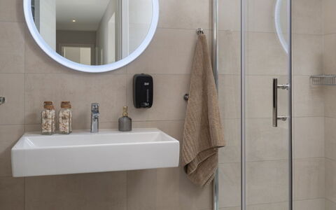 Villa Fasana: Bathroom, Bathroom Sink, Plumbing Fixture, Mirror, Sink, Interior Design, Wall, Flooring, Toilet, Floor