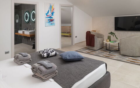 Villa Fasana: Furniture, Interior Design, Flooring, Floor, Bedroom, Wood, Bed, Room, Ceiling, Textile