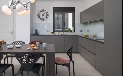 Villa Fasana: Furniture, Kitchen, Interior Design, Cabinetry, Countertop, Flooring, Light Fixture, Ceiling, Home, Kitchen Appliance