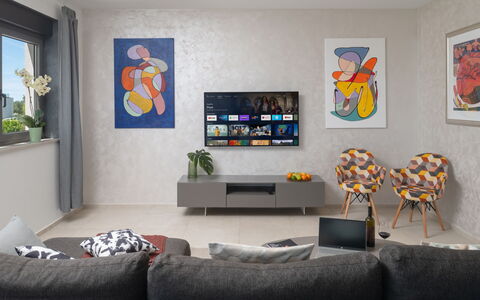 Villa Fasana: Interior Design, Wall, Furniture, Electronic Device, Living Room, Flooring, Television, Television Set, Room, Floor