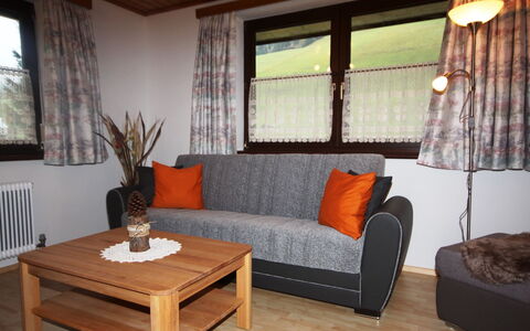 Thaler: Furniture, Room, Living Room, Interior Design, Property, Curtain, Window Treatment, Building, Window Covering, Coffee Table