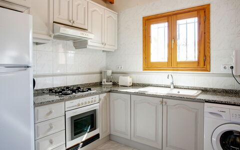 Villa Moreana: Cabinetry, Property, Countertop, Sink, White, Building, Window, Kitchen Stove, Tap, Kitchen