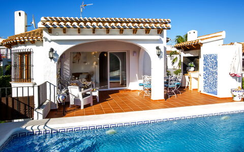 Villa Moreana: Water, Property, Furniture, Sky, Building, Plant, Azure, Chair, Swimming Pool, House