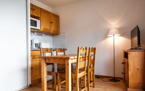 Super Besse 110: Property, Cabinetry, Furniture, Table, Wood, Chair, Lighting, Desk, Interior Design, Countertop