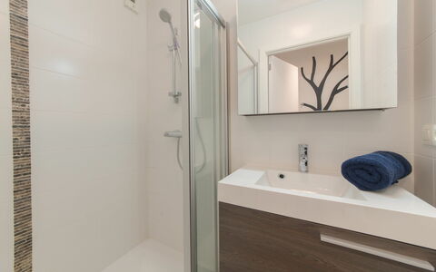 Ocean with Parking: Building, Bathroom Cabinet, Tap, Property, Plumbing Fixture, Mirror, Cabinetry, Interior Design, Sink