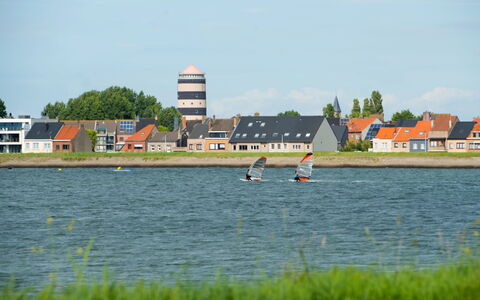 Helvetia with Parking: Water, Sky, Plant, Building, Boat, Watercraft, Lake, Coastal And Oceanic Landforms, Cloud, Watercourse