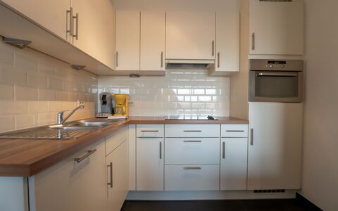 Zeeparel 402 with Balcony: Countertop, Kitchen, Kitchen Appliance, Cabinetry, Flooring, Interior Design, Major Appliance, Wood, Floor, Home Appliance