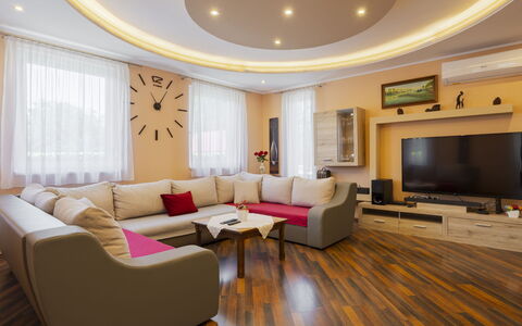Beige: Furniture, Interior Design, Flooring, Couch, Floor, Wood, Ceiling, Living Room, Wood Flooring, Room