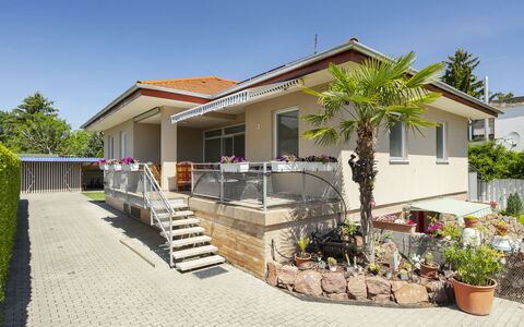 Beige: Building, House, Residential Area, Home, Facade, Architecture, Roof, Porch, Human Settlement, Door