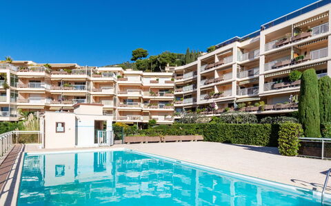 Eze 100: Water, Property, Sky, Building, Plant, Azure, Swimming Pool, Tree, Leisure, Condominium