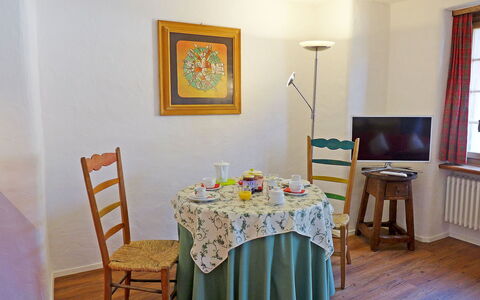 Chesa Rossa: Dining Room, Room, Furniture, Property, Yellow, Interior Design, Floor, Table, House, Wall