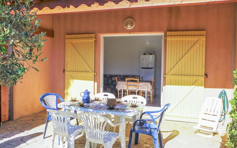 Plein Sud: Furniture, Plant, Property, Table, Chair, Building, Door, Shade, Decoration, Wood