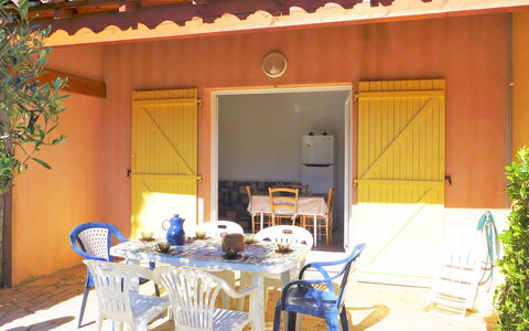 Plein Sud: Table, Furniture, Building, Property, Plant, Chair, Door, Lighting, Shade, Wood