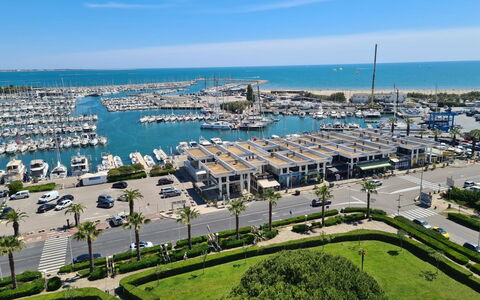 Les Jardins du Vidourle: Sky, Water, Plant, Cloud, Infrastructure, Tree, Body Of Water, Urban Design, Coastal And Oceanic Landforms, Boat