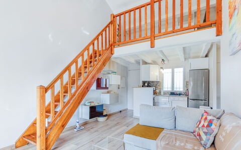 Cavalaire 460: Couch, Building, Orange, Wood, Shelving, Interior Design, Bookcase, Flooring, Floor, Living Room