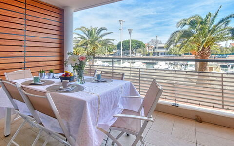 Fréjus 185: Table, Furniture, Property, Plant, Sky, Chair, Building, Tableware, Cloud, Water