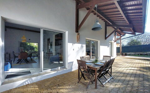 Bernadon: Door, Home, Floor, Chair, Shade, Porch, Home Door, Outdoor Structure, Hardwood, Wood Stain