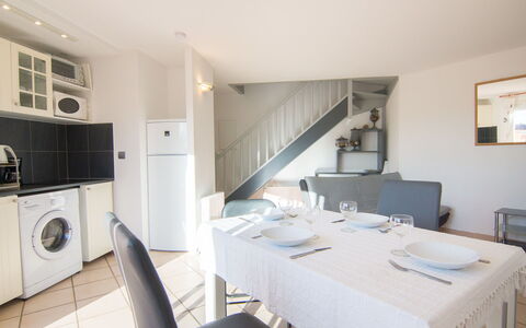 Les Andalouses: Furniture, Cabinetry, Table, Building, Chair, Kitchen Appliance, Tablecloth, Flooring, Floor, Wood
