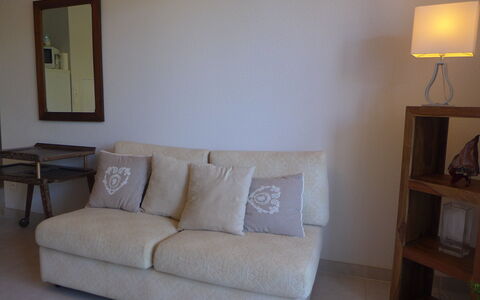 Selvia Quetia: Furniture, Property, Light, Picture Frame, Couch, Rectangle, Wood, Lighting, Interior Design, Yellow