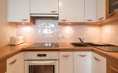 Les Trois Iles 102.5: Brown, Countertop, Cabinetry, Property, Kitchen Sink, Furniture, White, Sink, Kitchen, Kitchen Stove
