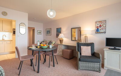 Les Trois Iles 102.2: Picture Frame, Furniture, Property, Table, Wood, Interior Design, Drawer, Comfort, Living Room, Floor