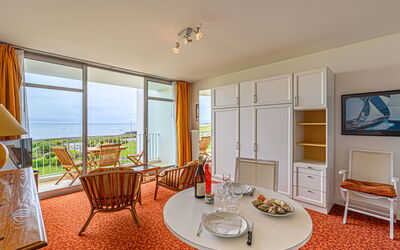 Les Trois Iles 102.12: Furniture, Property, Table, Chair, Wood, Interior Design, Orange, Living Room, Window, Shade