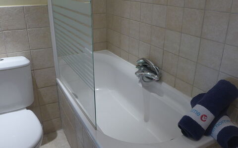 Villa Rose: Bathroom, Tile, Property, Room, Plumbing Fixture, Wall, Toilet, Bathroom Accessory, Tap, Toilet Seat